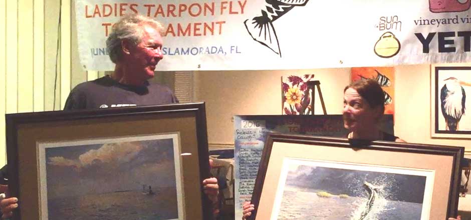Capt. Larry Sydnor, your Florida Keys fishing guide accepts 2nd place guide to best new angler at Ladies Tarpon Fly Tournament, Islamorada, FL